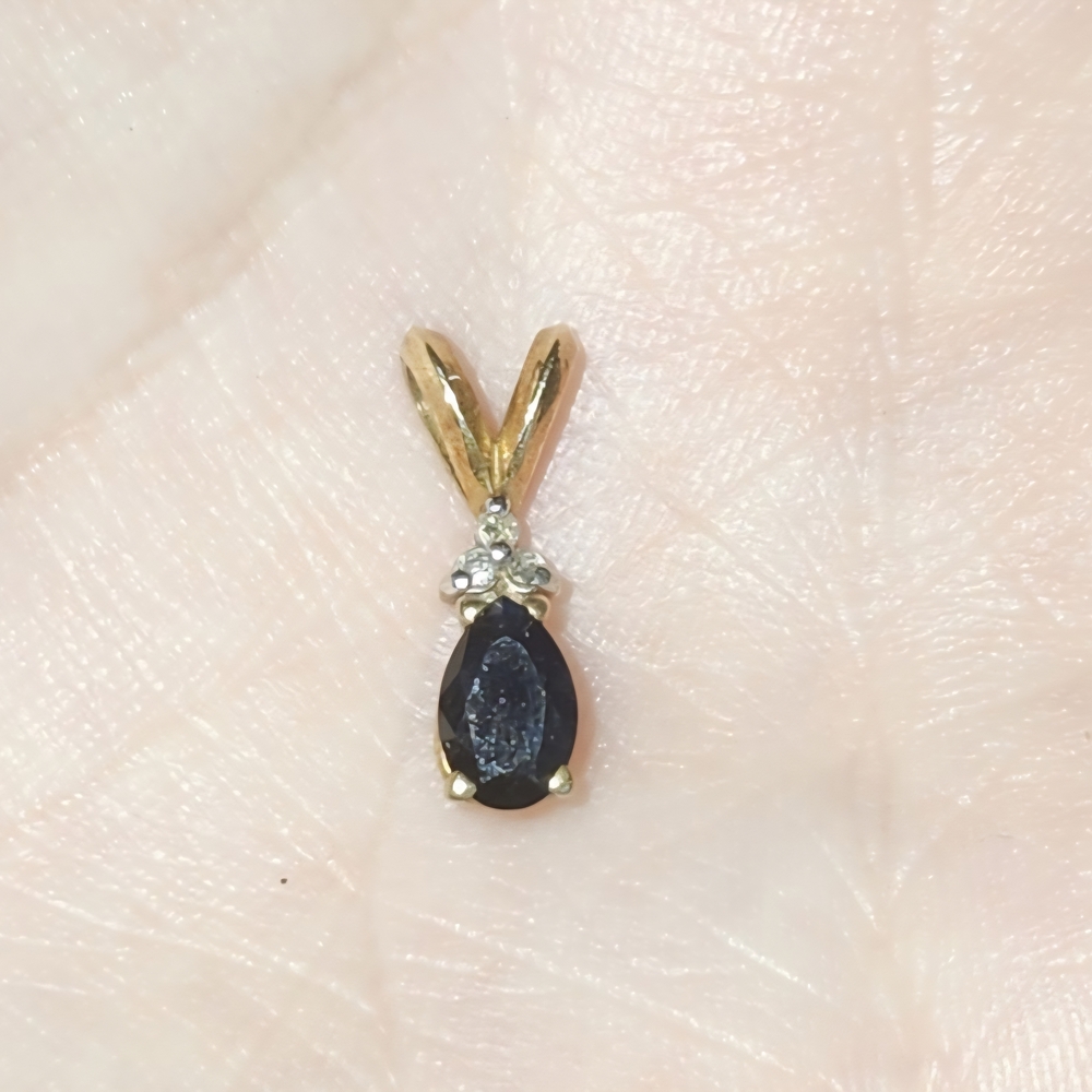 Elegant Gold and Sapphire Teardrop Pendant